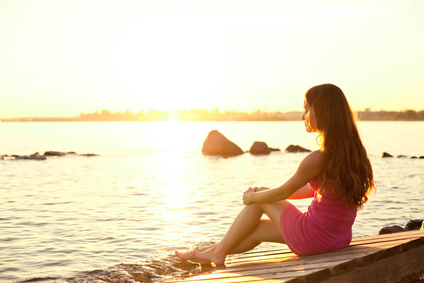 Peaceful woman on the beach